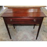 A George III mahogany sidetable fitted drawer on square tapered legs.