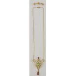 A fine belle epoque seed pearl and tourmaline pendant,