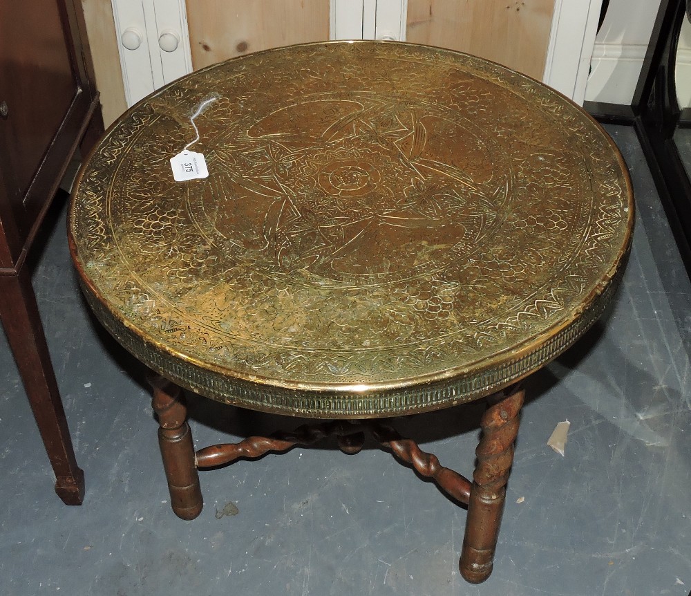 A Benares engraved brass table on folding stand, together with a green leather desk chair. - Image 2 of 2