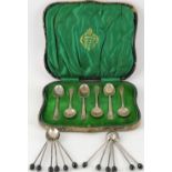 A set of 12 George V silver bean-end coffee spoons,