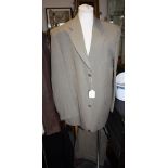 A Jaeger gentlemen's natural linen suit, the trousers with a pleated front and turn-ups, 52 Regular.