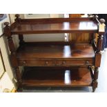 A Victorian mahogany three tier buffet fitted two drawers on turned fluted uprights, W. 120cm.