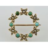 An early 20th century seed pearl and green stone brooch, in the from of a hoop set with flowers, 3.