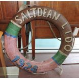 A decorative lifebuoy, with vintage style paintwork 'Saltdean Lido 1924', D. 70cm.