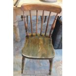 Five Victorian elm and beech Windsor comb back kitchen chairs.