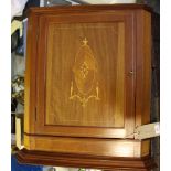 An Edwardian style marquetry inlaid hanging corner cabinet, H. 72cm.