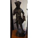 A large bronze of a Cossack standing on integral plinth,