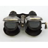 A pair of brass collapsible field glasses, W. 13cm.