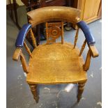 Three Victorian oak smokers' bow chairs, with circular turned disc splats with two H-stretchers,