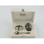 A boxed Christofle silver three piece christening set.