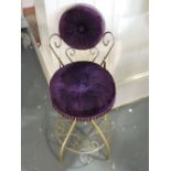 A 1970s gilt metal bedroom chair upholstered in purple plush fabric.