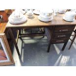 An oak three drawer single pedestal kneehole desk.