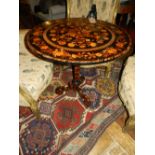 A 19th century marquetry inlaid circular tilt top table, raised on tripod base, H.