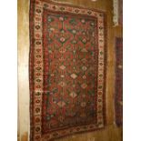 A Caucasian cream ground balouch runner carpet, decorated with geometric pattern to centre,