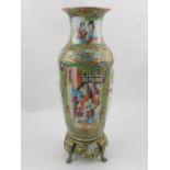 A Canton porcelain famille rose baluster vase, raised on a brass stand,