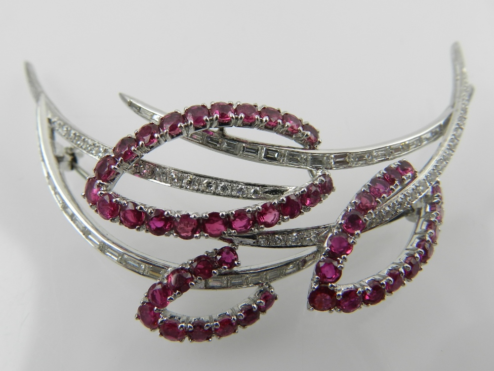 A white gold, diamond, and ruby set spray brooch,