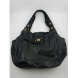 A Marc Jacobs black leather handbag, having gilt metal details.