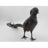 In the manner of Bergman; a Austrian coal painted bronze figural study of a cockerel. H.22cm L.