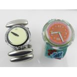 -- WITHDRAWN--A collection of four Swatch wristwatches to inclue Top PNB 116,