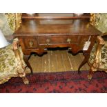 A Queen Anne walnut lowboy, having drop handles, raised on four cabriole legs, H.74cm, W.90cm, D.