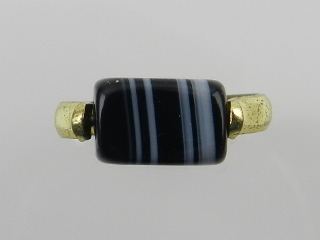 A gilt metal ring articulate set with a banded agate.