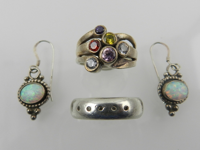 A pair of silver and opalite earrings, together with a silver ring set with small diamonds,