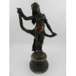 In the Art Nouveau style, a bronze bust of a female nude, raised on a circular base.