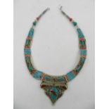 A white metal, coral, and turquoise beaded necklace,