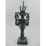 A Chinese bronze figural study of an ancient winged beast. H.