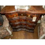 An 18th century Italian walnut commode, having concave block front. H.83cm, W.76cm, D.