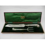 A 1910 silver serving set, cased.