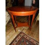 An Edwardian oval centre table, having marquetry inlay, raised on square tapered legs,