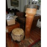 Two African drums. H.101cm (largest), H.39cm (smaller)