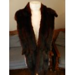 A brown mink fur shawl.