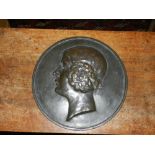 A bronze plaque, relief decorated with a profile portrait of a lady, reputably of Emmy Göreing,