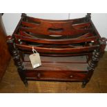 A 19th century mahogany four division canterbury, having single drawer,
