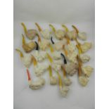 A collection of twenty-four meerschaum pipes