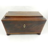 An early Victorian rosewood sucofocus tea caddy. H.20cm, W.