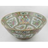 A large Chinese hard paste porcelain Canton bowl, decorated in the famille rose pallet. H.15cm D.