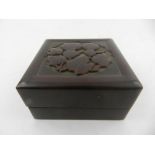 Four small soapstone seals, contained in a square soapstone box, bearing character mark to base,