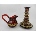 A Bohemian red glass scent bottle, the stem mounted with a gilt painted snake,