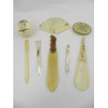 A selection of sundry Chinese ivory and mother-of-pearl items, to include pin boxes, letter openers,