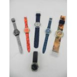 --WITHDRAWN-- A collection of seven Swatch watches, to include a 1992 model,
