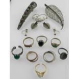 A quantity of white metal jewellery, to include a filigree leaf brooch,