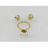 Puig Doria. An unusual yellow metal and pearl set ring, together with a pair of yellow metal and