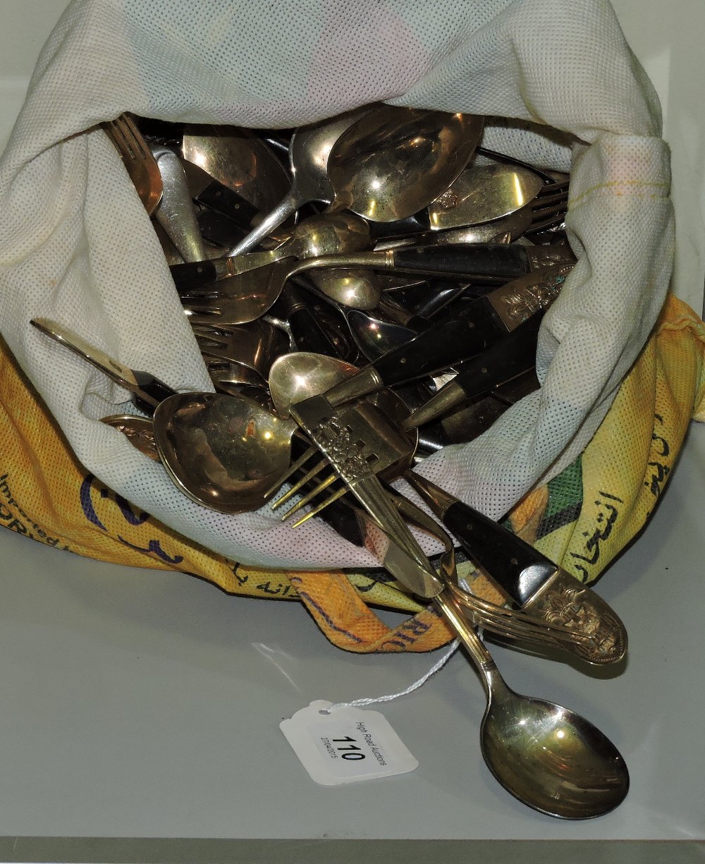 A gold plated Siamese cutlery service, with part ebonised handles,