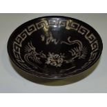 A Jizhou Kiln style bowl, decorated with phoenix with a geometric border, D. 16cm.