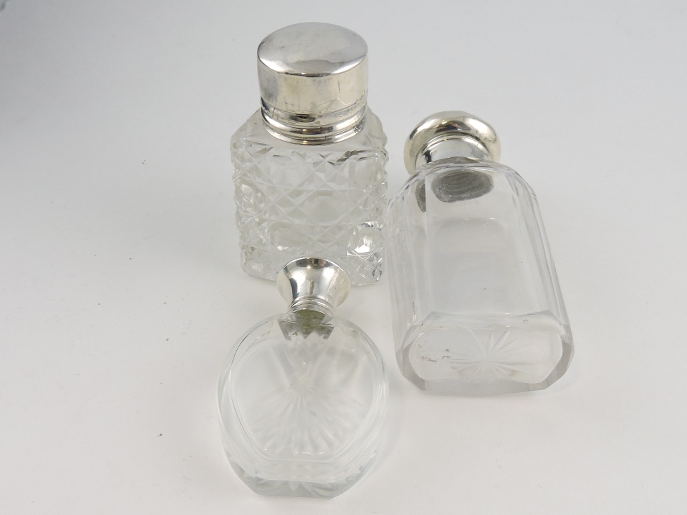 A glass and silver mounted smelling salt bottle,