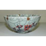 A crackle glazed celadon bowl, with polychrome decoration of flowers and birds, D. 14cm.