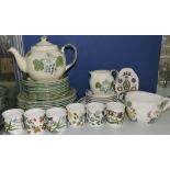 A Poole Pottery part tea service including teapot, milk jug and side plates,